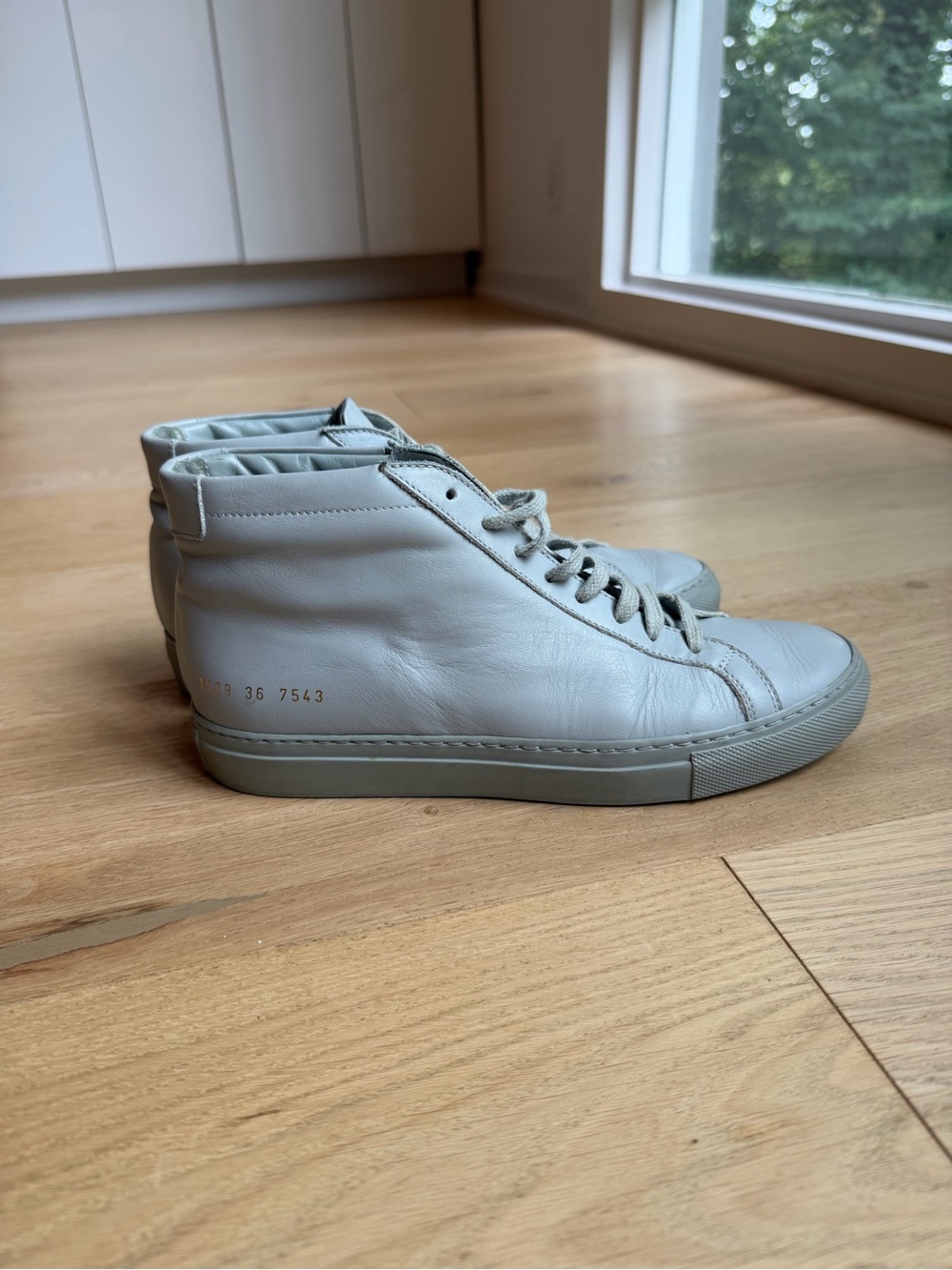 Common Projects Minimal High-Top Leather Sneakers in Light Gray